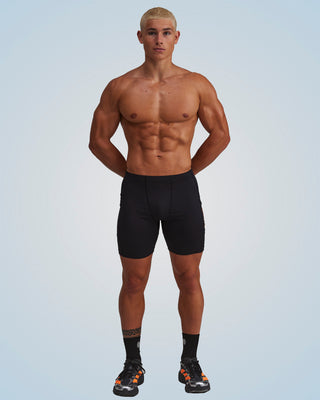 PERFORMANCE EVOLUTION HALF TIGHTS 7" BLACK/ORANGE CIRCUIT